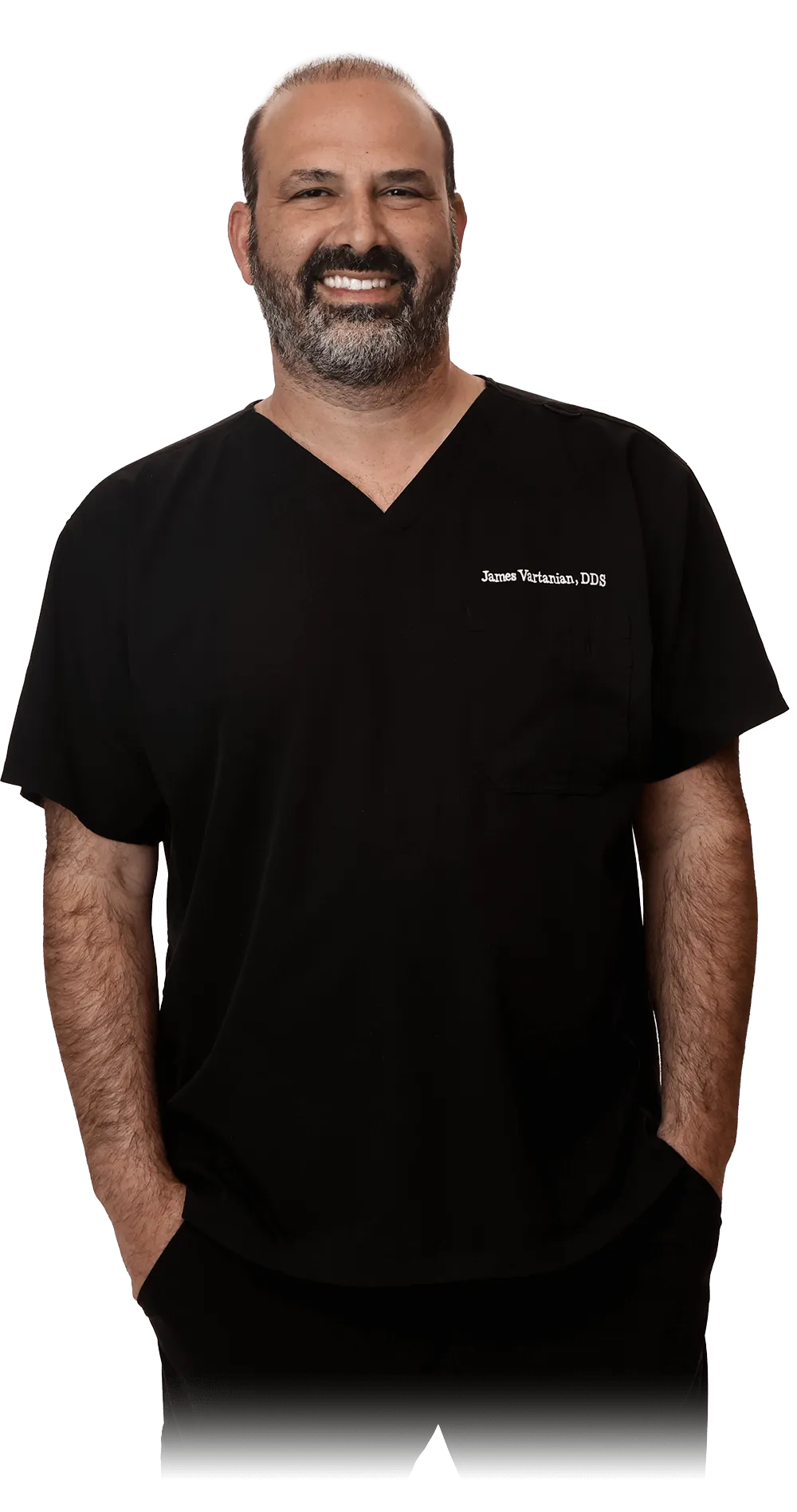 Portrait of Dr. James Vartanian, DDS, smiling confidently in a black dental uniform with his name embroidered on the chest. He presents a professional and reassuring presence, ideal for emergency dental care.