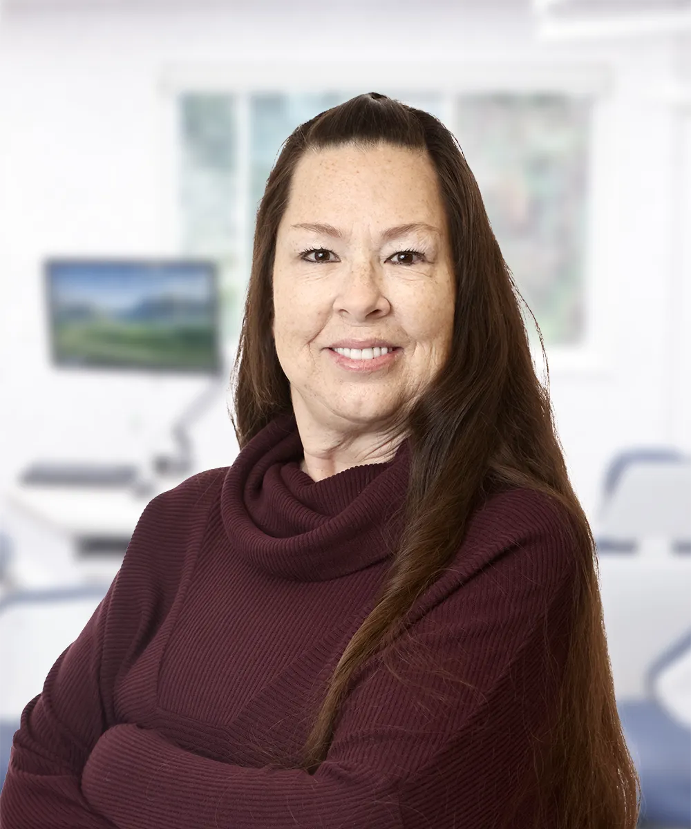 A headshot of Bridget P., smiling brightly, representing her positive testimonial for Vartanian Dental Group.