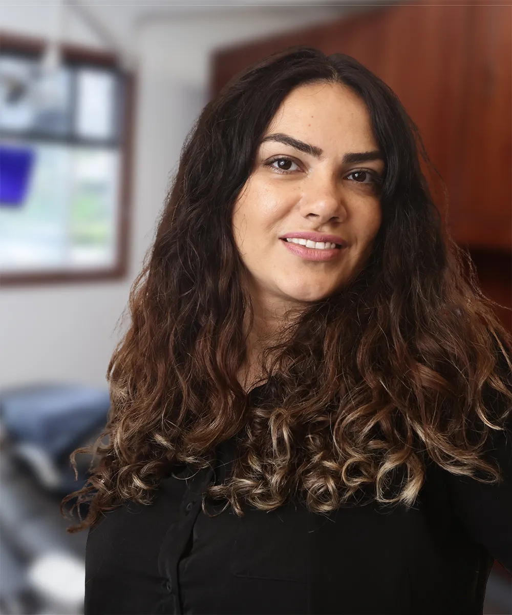 A close-up of Maryom A., smiling, reflecting her positive experience at Vartanian Dental Group.