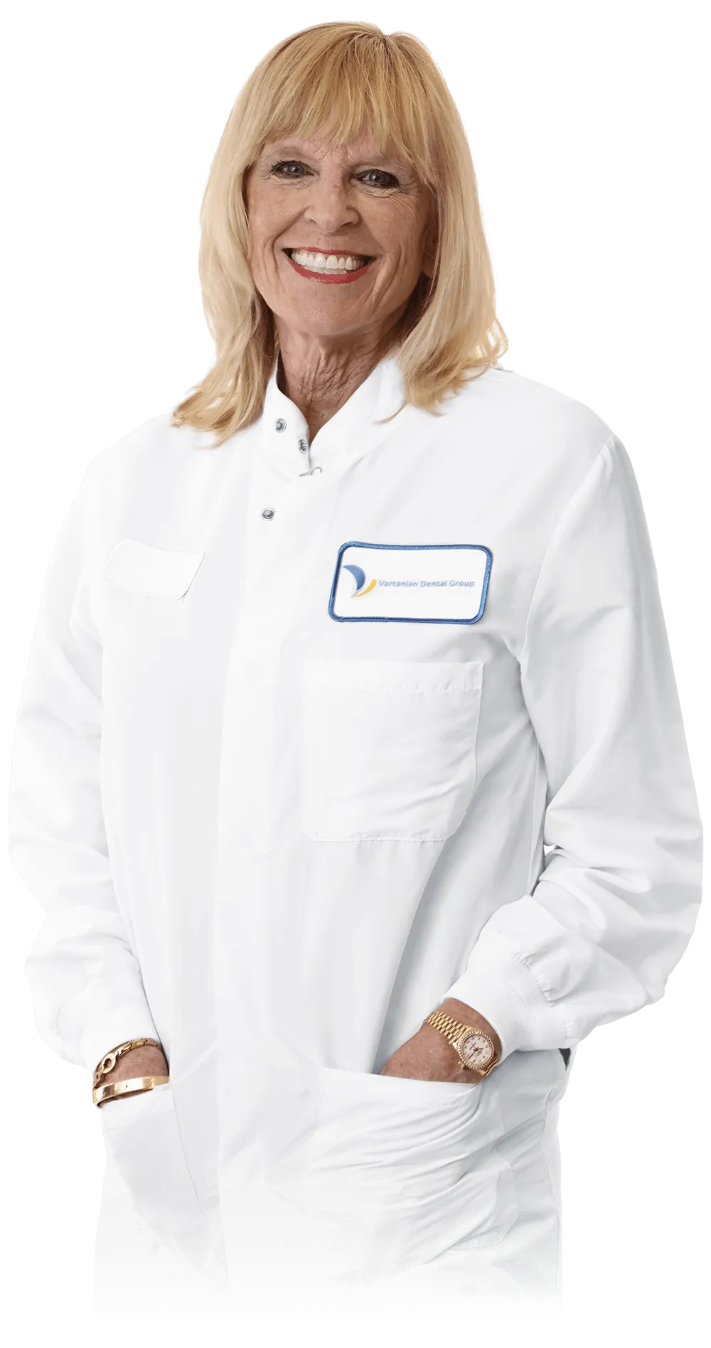 A senior female dental professional, Donna C., in a white lab coat with the clinic’s logo, smiling warmly. Her experience and gentle demeanor are reassuring for patients undergoing treatments for gum disease.